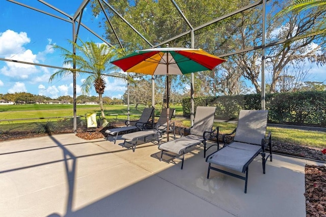 view of patio with a lanai