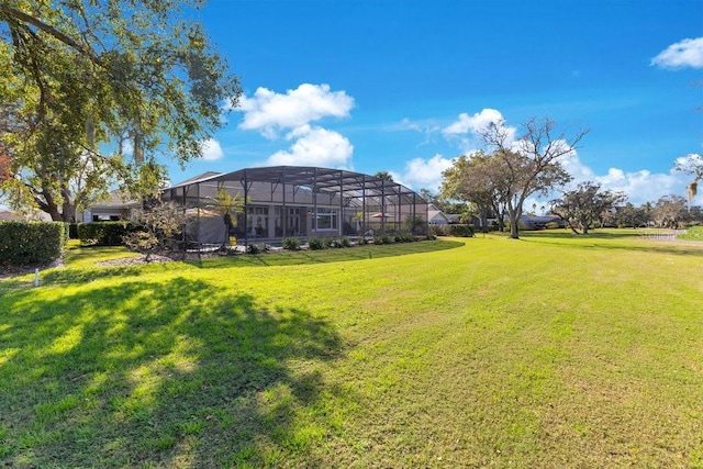 view of yard featuring a lanai