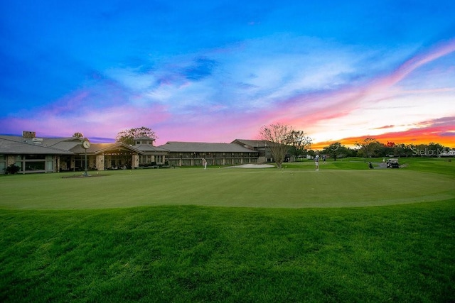 surrounding community featuring a lawn