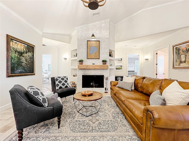 living room featuring built in shelves, a stone fireplace, vaulted ceiling, and ornamental molding