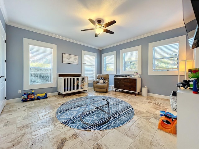 bedroom with ceiling fan and crown molding