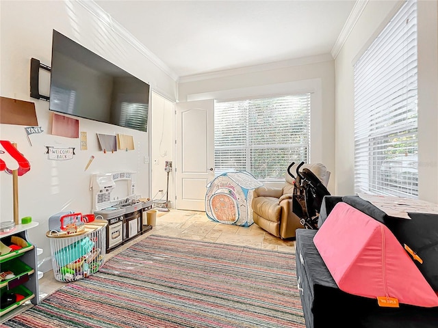 rec room with light tile patterned floors and crown molding