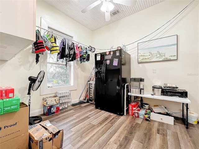 interior space featuring ceiling fan