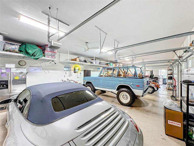 garage featuring ceiling fan and a garage door opener