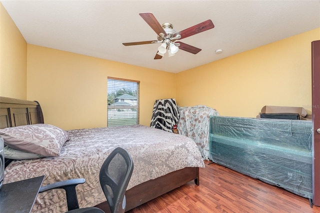 bedroom featuring ceiling fan and wood-type flooring