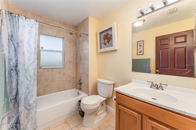 full bathroom featuring toilet, vanity, tile patterned floors, shower / bath combo, and a textured ceiling