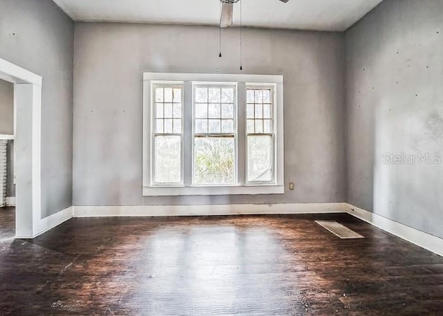 spare room with ceiling fan