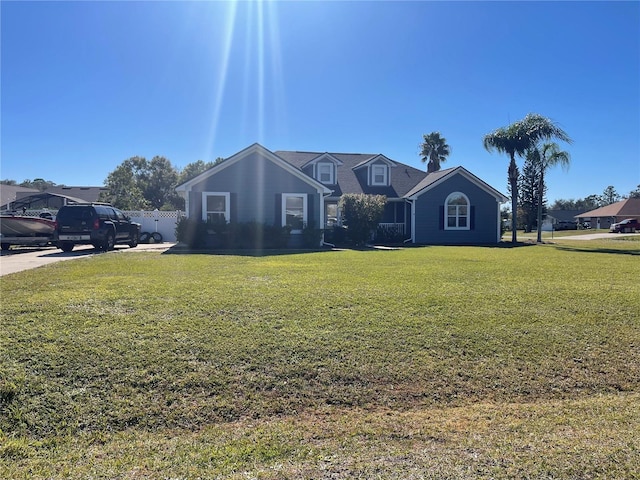 view of front of home with a front lawn