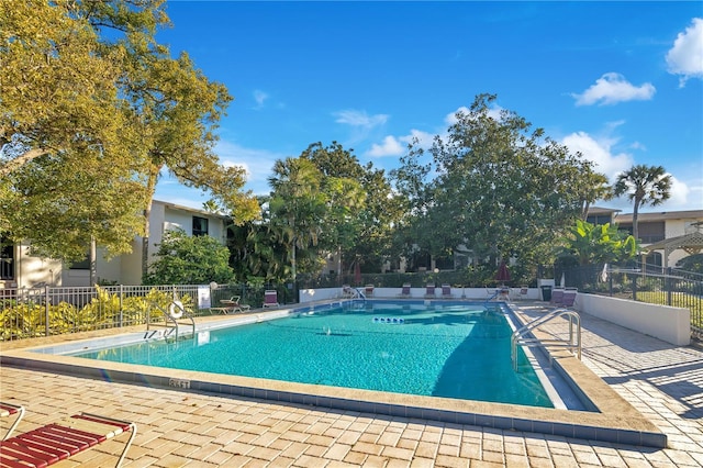 view of pool featuring a patio area