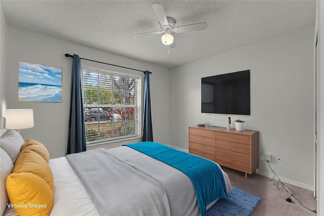 carpeted bedroom with ceiling fan