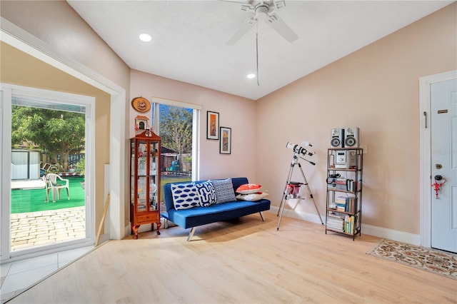 743 Golden Sunshine Cir, Orlando, FL 32807 - living area featuring ceiling fan and light wood-type flooring