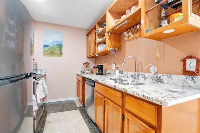 743 Golden Sunshine Cir, Orlando, FL 32807 - kitchen featuring light stone countertops, sink, and appliances with stainless steel finishes
