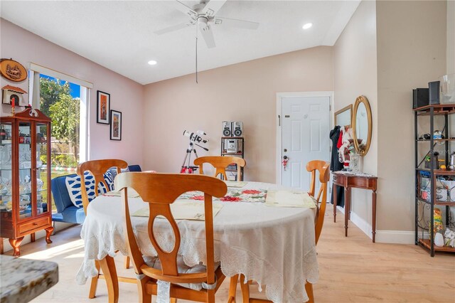 743 Golden Sunshine Cir, Orlando, FL 32807 - dining area featuring ceiling fan, vaulted ceiling, and light hardwood / wood-style flooring