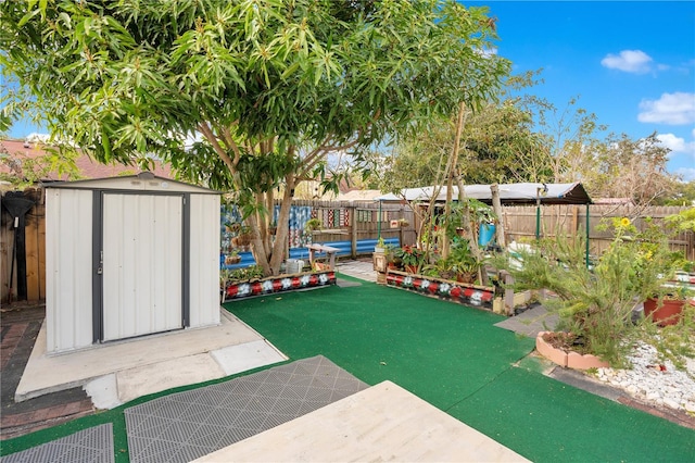 743 Golden Sunshine Cir, Orlando, FL 32807 - view of community with a pool and a storage shed