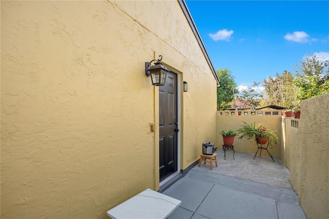 743 Golden Sunshine Cir, Orlando, FL 32807 - property entrance with a patio area