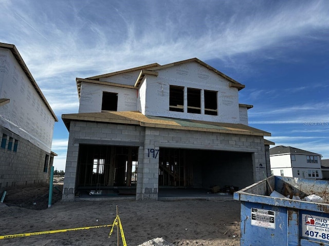 property under construction featuring a garage