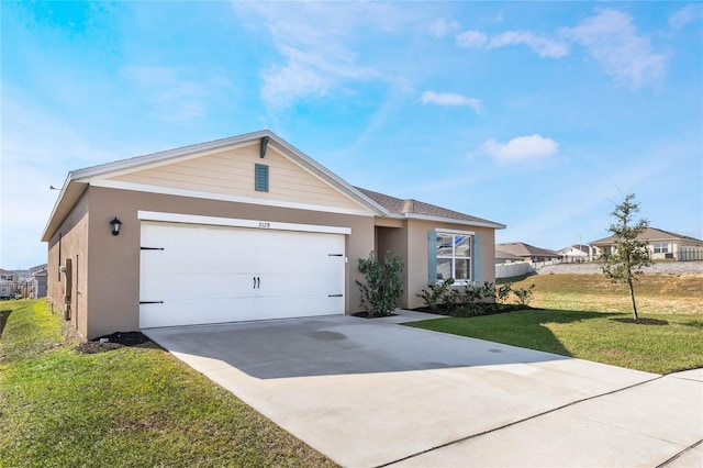 single story home with a front lawn and a garage