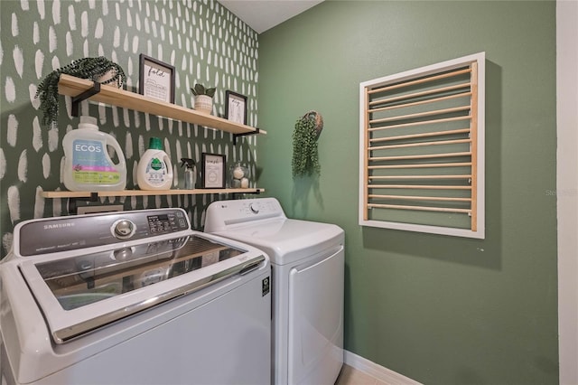 washroom featuring independent washer and dryer