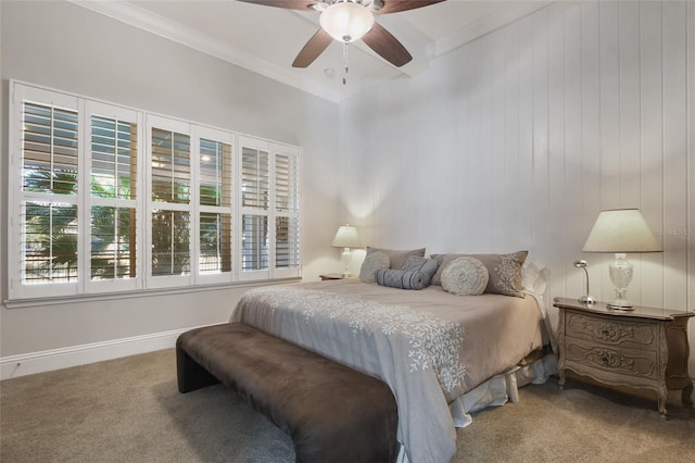 bedroom featuring crown molding, ceiling fan, and carpet floors