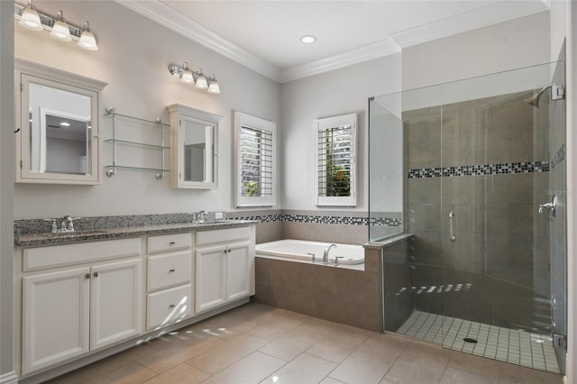 bathroom featuring vanity, tile patterned flooring, ornamental molding, and independent shower and bath