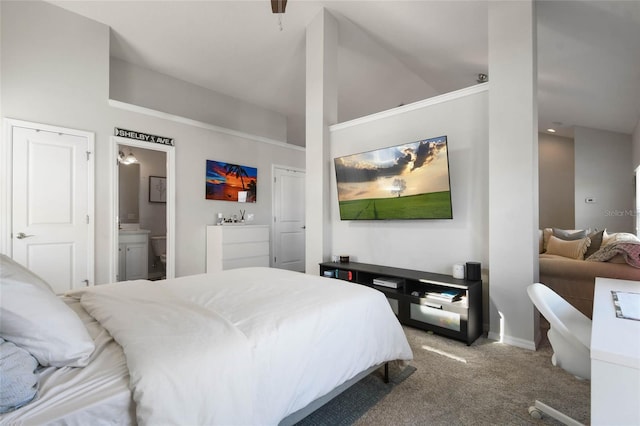 carpeted bedroom with ensuite bath