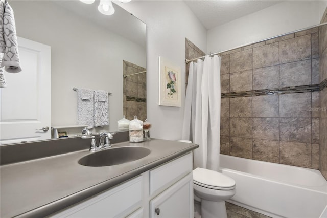 full bathroom featuring vanity, shower / bathtub combination with curtain, a textured ceiling, and toilet