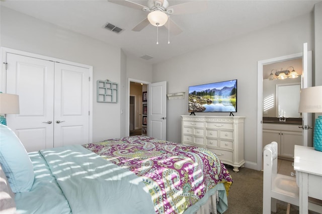 carpeted bedroom featuring ceiling fan and a closet