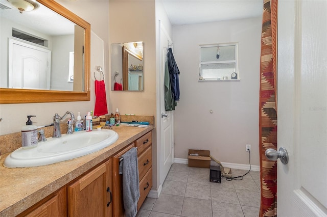 bathroom featuring vanity and tile patterned floors