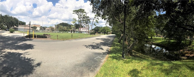 view of street with a water view