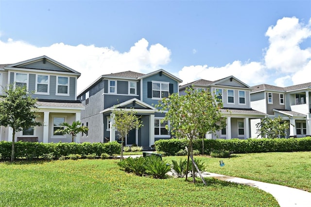 view of front of home with a front lawn