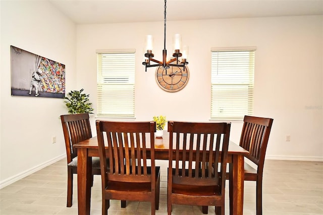 dining room with a chandelier