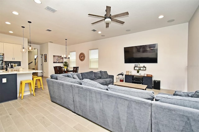 living room featuring ceiling fan