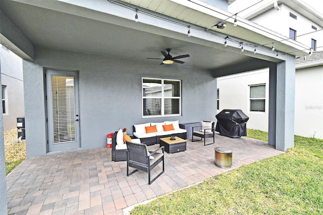 view of patio featuring outdoor lounge area, a grill, and ceiling fan