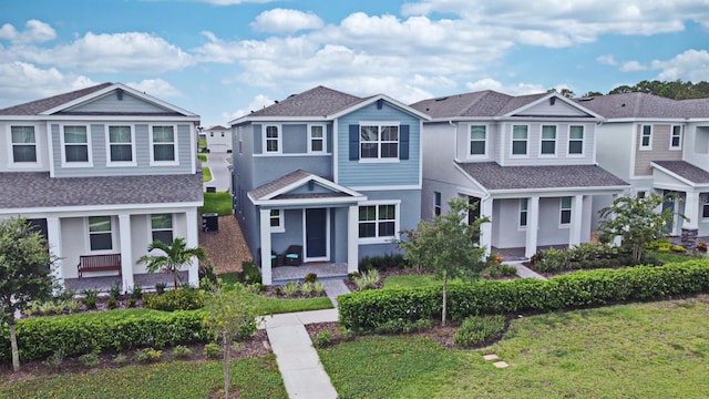 view of front of property with a front lawn