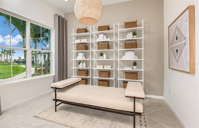 sitting room featuring tile patterned flooring