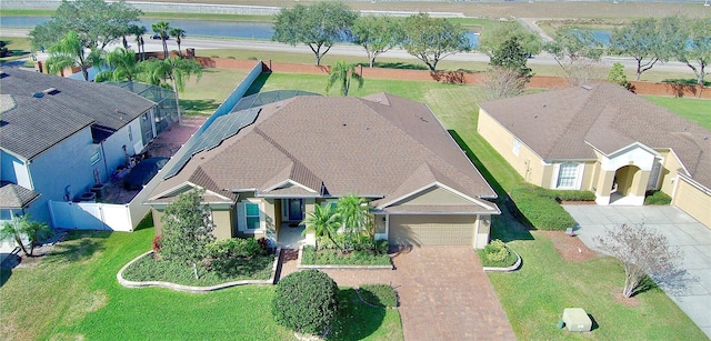 birds eye view of property with a water view