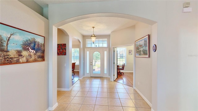 entrance foyer featuring light tile patterned flooring