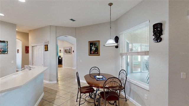 view of tiled dining space