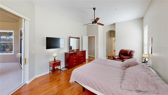 bedroom featuring light hardwood / wood-style floors and ceiling fan