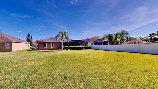 view of yard featuring a lanai