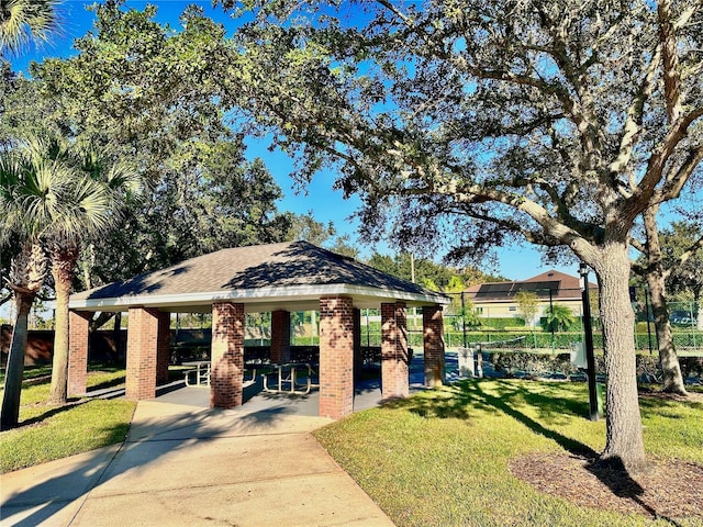 surrounding community featuring a yard and a gazebo