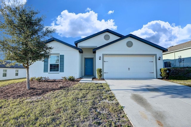 single story home featuring a garage