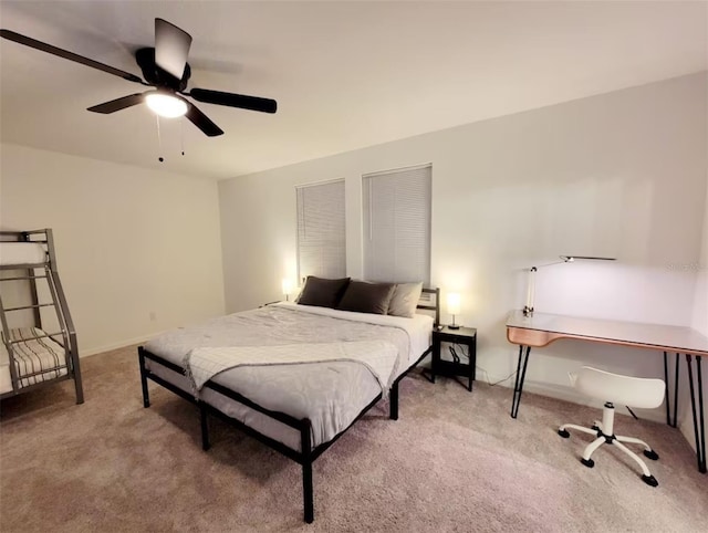 bedroom featuring light carpet and ceiling fan