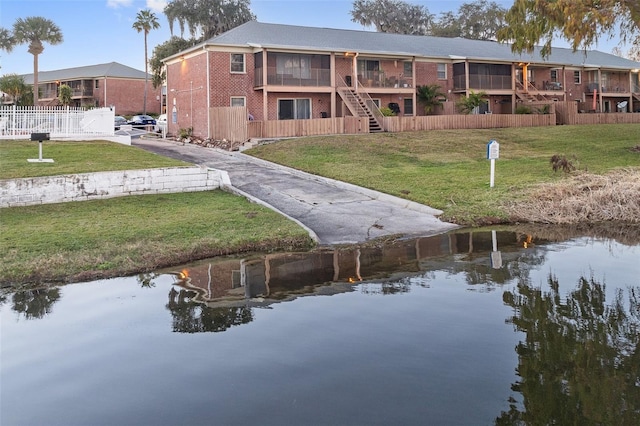 exterior space with a water view