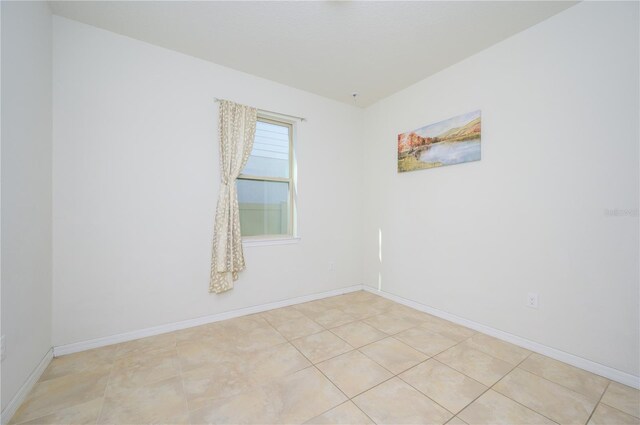 view of tiled spare room