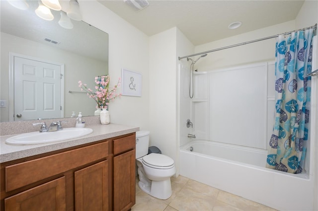 full bathroom featuring tile patterned flooring, vanity, toilet, and shower / tub combo with curtain