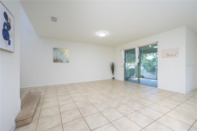 view of tiled spare room