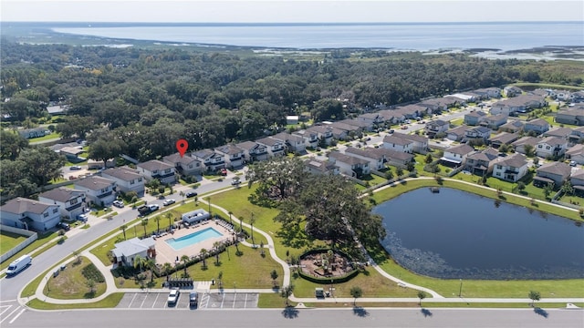 drone / aerial view with a water view