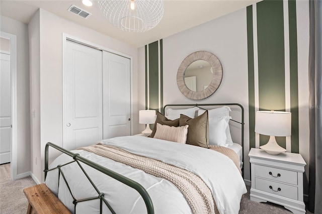 carpeted bedroom featuring a closet