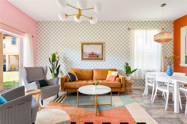 living room featuring hardwood / wood-style floors and a chandelier